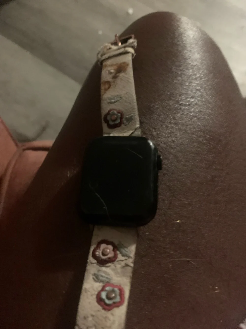 Apple Watch with Black Case and Cream Strap